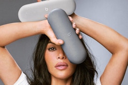 kim kardashian holding beats pill speakers