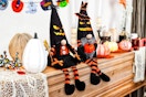 Lifestyle image of the 2 piece Halloween Gnome Plush Decorations 