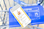 Smartphone with KCL app displaying a 1-Clip coupon