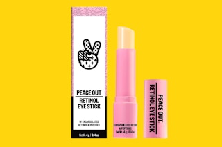 A Peace Out retinol stick next to its box