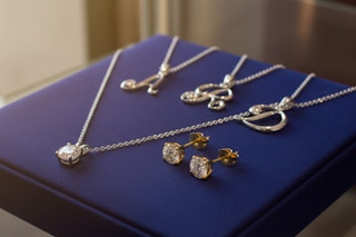diamond jewelry on a blue display