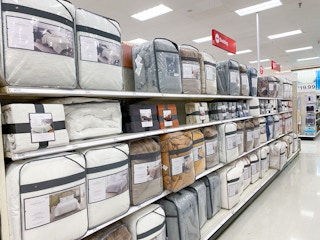 comforters sitting on a target shelf