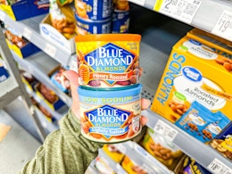 2 Blue Diamond Almond containers stacked on top of each other in Walmart grocery aisle 