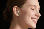women wearing wireless earbuds