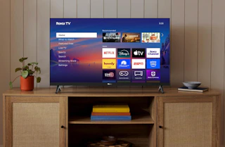 a Roku TV on a TV stand 