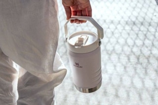 a stanley jug being carried