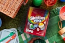 Skittles pop'd in picnic setting