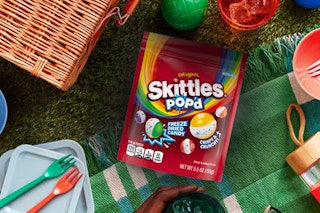 Skittles pop'd in picnic setting