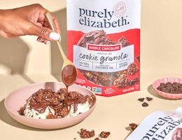 a bag of granola next to a bowl of food 