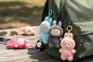 a Plush Macaron Doll with Keychain Loop