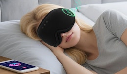 a person with sleep mask headphones on