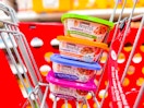 4 purina beneful tubs sitting in a target cart