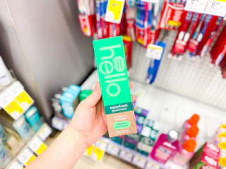 hand holding hello spearmint toothpaste walgreens
