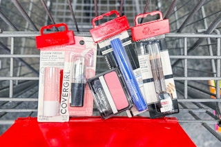covergirl lip balm, lipstick, blush, mascara, and eyeliner in a cart