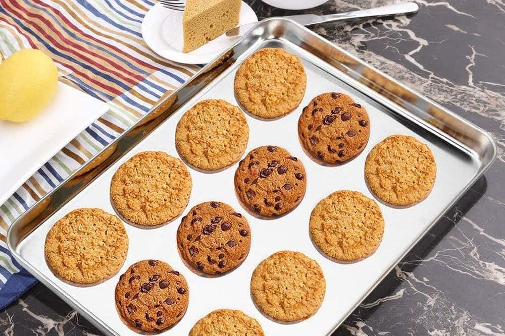 A sheet pan with 12 cookies on it.