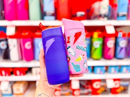 hand holding 2 gatorade bottles at Target