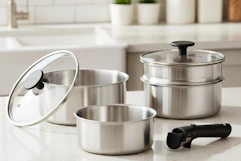 stainless steel cookware set on a kitchen counter