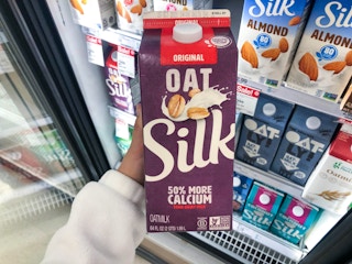 hand holding silk oatmilk at target