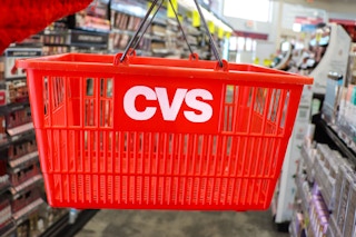 cvs shopping basket in a store aisle