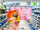 hand holding venus and gillette razor refills