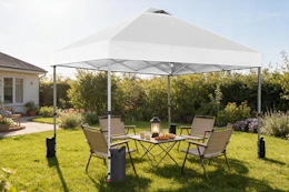 a canopy tent in a yard