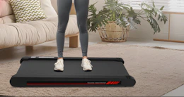 a person standing on a walking pad