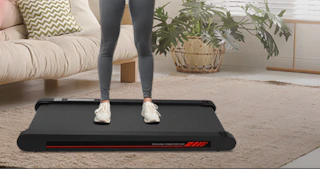 a person standing on a walking pad