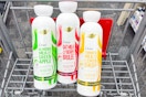 3 bottles of dove plant milk body wash in a cart