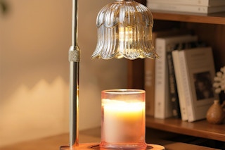 a candle warmer lamp on a table