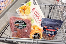 aldi charcuterie foods in a shopping cart