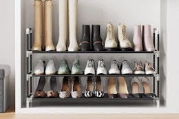 a shoe rack in a closet
