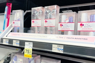 shelf with products and a 75% off yellow clearance tag