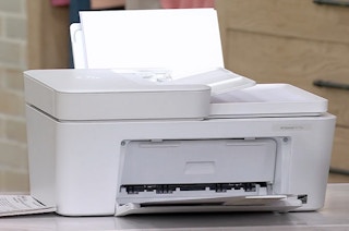 a hp deskjet printer on a table