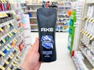 hand holding axe body wash in walgreens