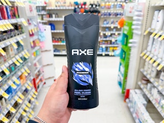 hand holding axe body wash in walgreens