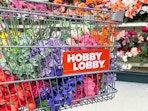 a hobby lobby cart filled withy faux flowers 