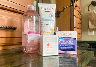 a selection of skincare on a bathroom counter