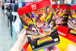 hand holding nintendo switch donkey kong bananza game at costco