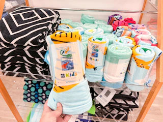 The Big One kid's beach towels on display at Kohls
