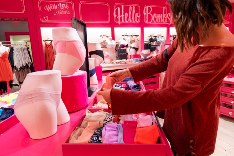 Person looking at panties at Victoria's Secret