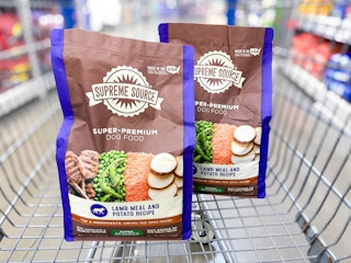 two bags of supreme source dog food in walmart cart