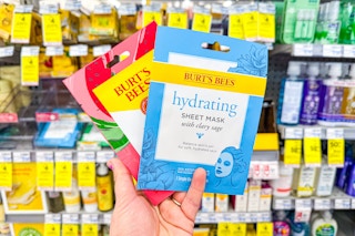 hand holding burt's bees face masks in cvs