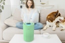bright green air purifier on coffee table