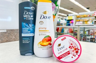 two bottles of body wash and a jar of body scrub on store beauty counter