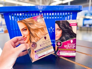 2 Schwarzkopf hair colors in front of Walmart shopping basket