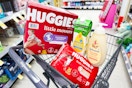 huggies diaper box and pack in a cart with 2 johnsons baby washes