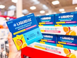 hand holding a box of liquid iv