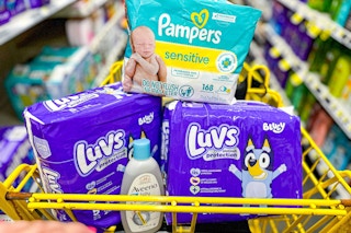 luvs, pampers, and aveeno products in a yellow shopping cart