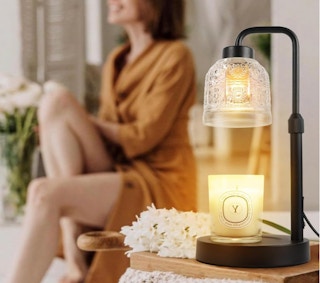 a candle warmer lamp on a table