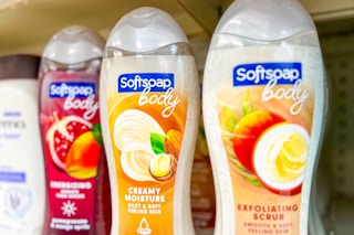 three bottles of softsoap body washes